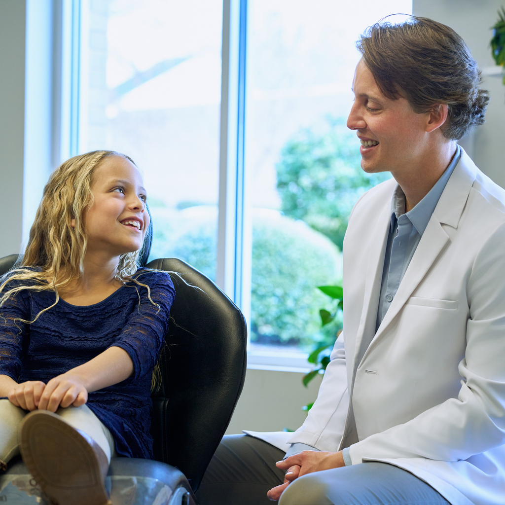 Dr Pittman Talking With A Child Patient 1